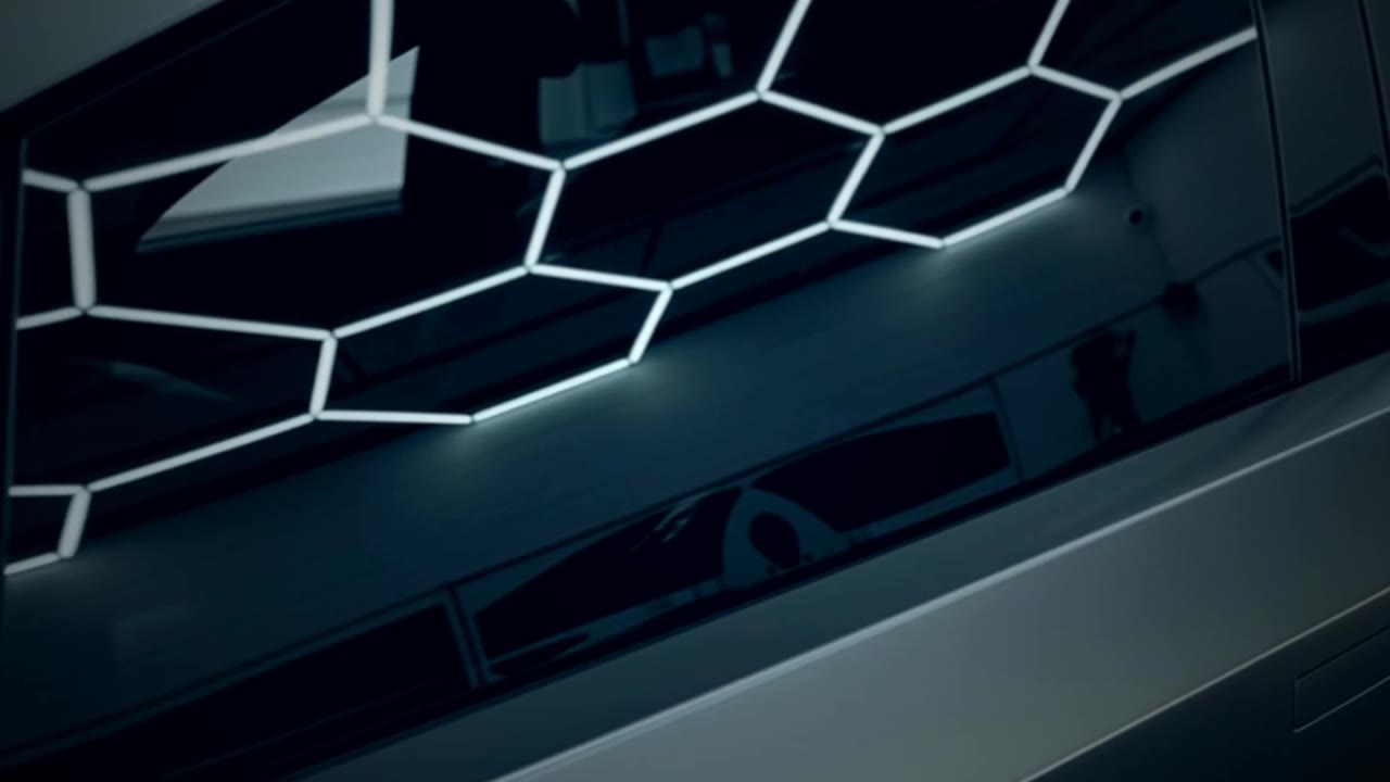 Matte Tesla Cybertruck parked under studio lighting at Garage 7 in Philadelphia